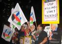 Gush Shalom activists with the movement's flags