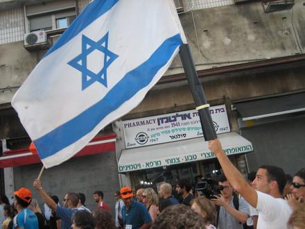 Peace activist waves national flag