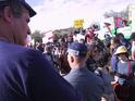 soldiers and policemen stop the demonstrators