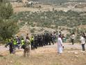 Demonstrators and policemen face to face