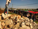 A giant Palestinian flag carried in the procession 