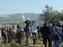 The first demonstrators confront the soldiers next to the Fence (Right top corner) 