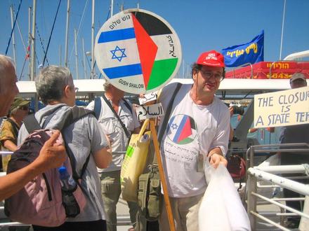 Peace activists Beate Zilversmidt and Adam Keller, two of the organizers, leaving the boat