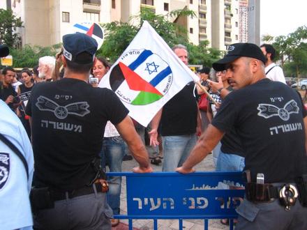 Members of the Special Police Squad defend the home of the Minister 