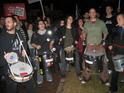 A band of drummers alerts the neighborhood