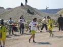 Bassem Playing football against the neighboring village in an improvised field between the Fence and Modi’in Illit settlement