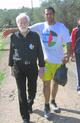 Bassem wearing the Gush shalom shirt with the flags of Israel and Palestine